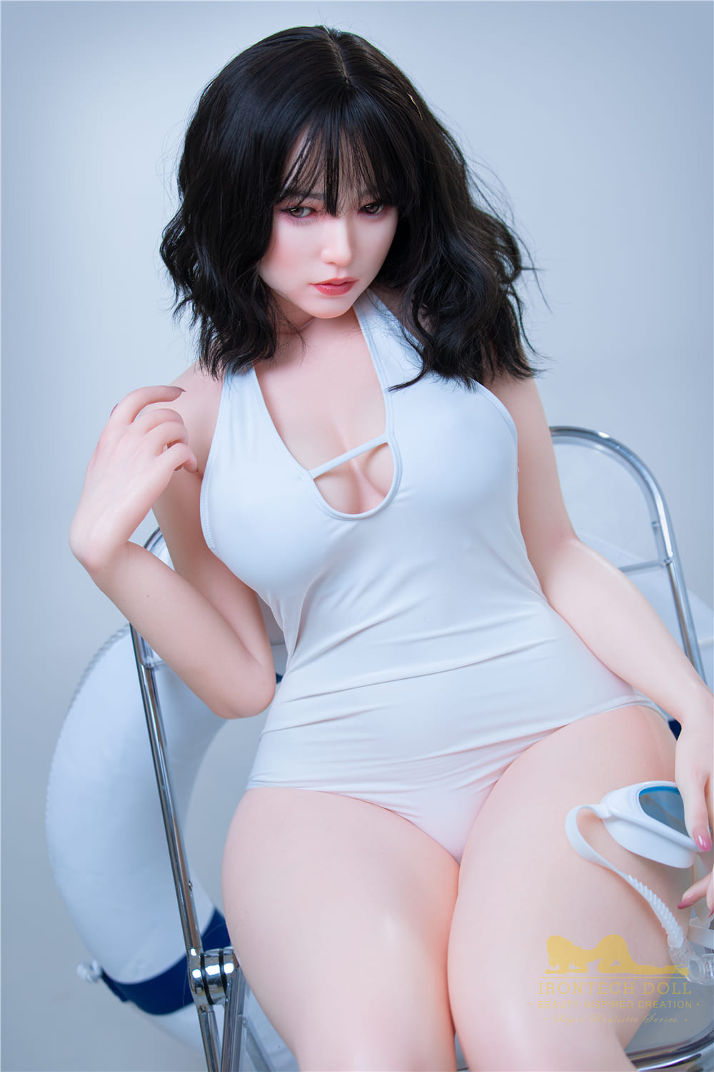 Irontech asian silicone sex doll sitting down